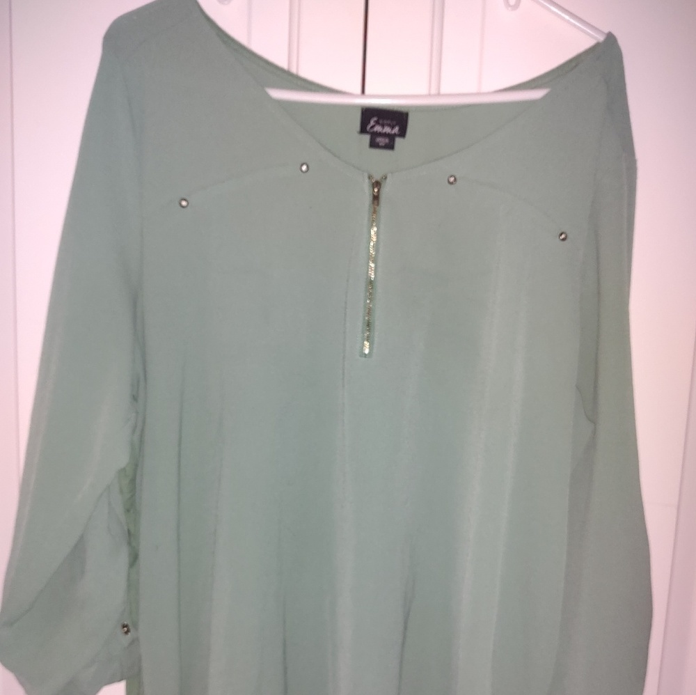 Sage green women's blouse.